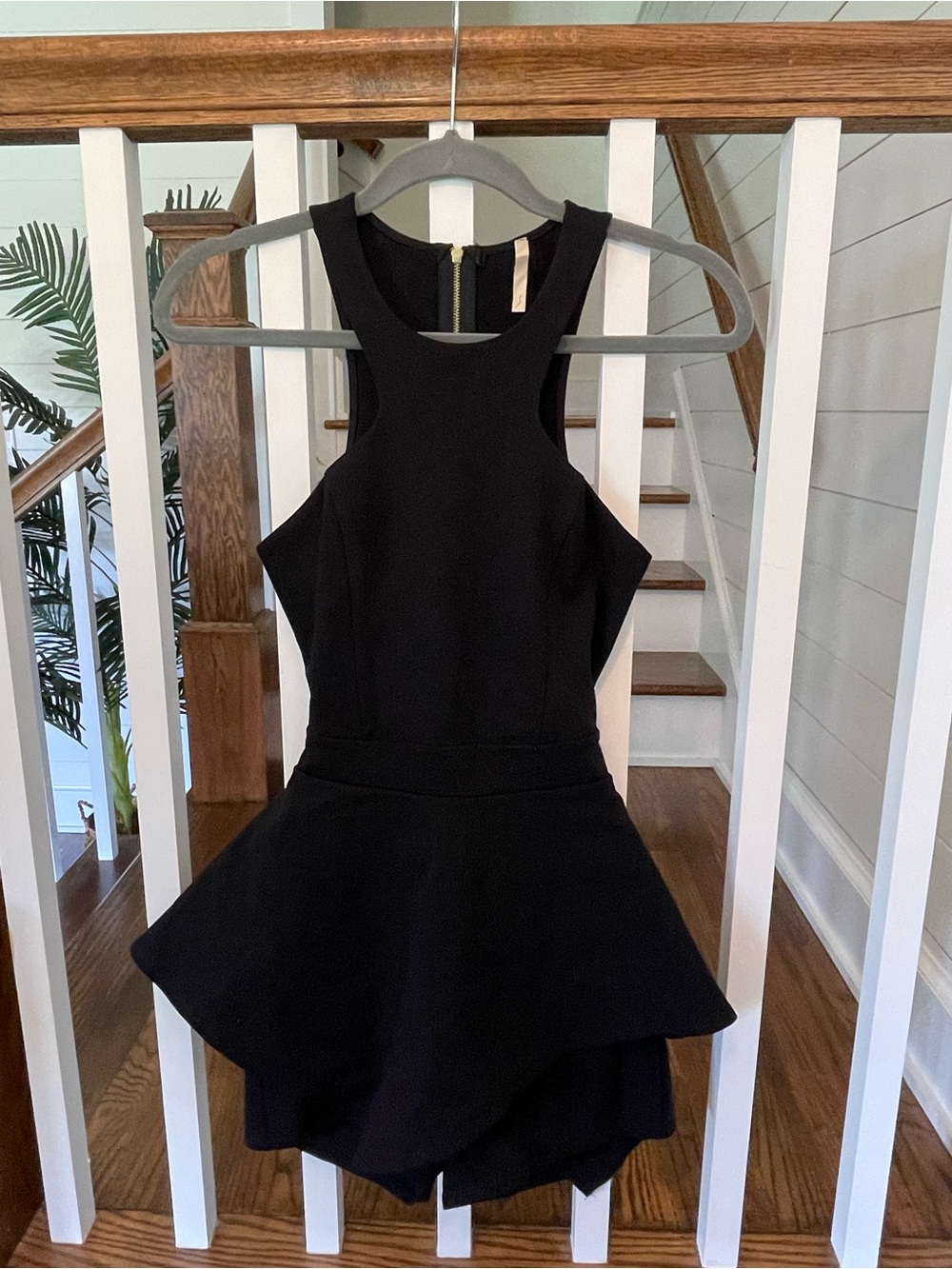 chic Black Sleeveless Peplum Romper